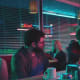 Next shot, Jeremy is all of the sudden in the seat next to Aaron.