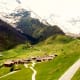 Clusters of homes seen scattered throughout the mountainous region.