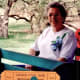 My mother is on the Sad Monkey Railroad ride while touring Palo Duro Canyon.
