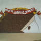 Okmulgee holds the worlds record for the largest pecan pie. This mural can be found in a small park in the downtown Okmulgee historic district.