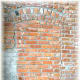 Bricked in doorway that used to be a conduit between a hardware store and a brothel next door.