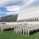 More than 1,300 basic cadets salute June 26 during their first reveille formation at the U.S. Air Force Academy in Colorado Springs, Colorado.