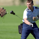 Cadet 1st Class Mike Heddinger lets the U.S. Air Force Academy mascot catch a food-laden lure during training.