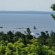 View of both Round Island Lighthouse & Round Island Channel Lighthouse (just above treeline).