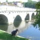 Boy on Le pont coudé, Brantome. Also called 'the right angle bridge'