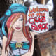 Cartoon waitress greets you at the entrance to the Crab Shack dining area.