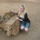 You can even pet cute little lion cubs