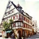 Two photos pieced together showing cross or half-timbered houses in Herrenberg