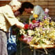 Flowers being combined for the altar decorations.