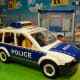 My son wanted to play with the police cars . . .