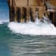 Watch the waves crashing to gain a feel for their timing.