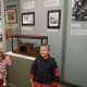 Standing next to a model of a train, showing the importance of the railroads in Pennsylvania