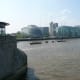 The river Thames is so murky and dark because its muddy bottom is constantly stirred up by tidal currents.