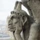 The infamous Spitting Gargoyle looks bored. Just another day hanging out in Paris. (He's a stryge in classical lore -- a bird of ill omen that feeds on human flesh and blood.)