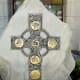 The Celtic Cross sculpture outside Christ Church Cathedral was created by Samuel Bates.