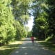 A jogger runs along the trail