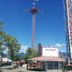 The Hellavator is popular because it suddenly and very rapidly moves passengers upwards. The ride in the background is the Atmosfear.
