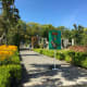 Walking through the Italian Garden to the animated dinosaur exhibit