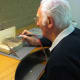 Workshop officer Leo demonstrates silver smithing in a previous exhibition.