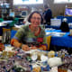 Elisa with a gorgeous display of gemstones for sale at the 2010 exhibition.
