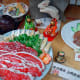 Plastic food on display in front of a restaurant