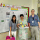 L-r: Clap Global founder Shirin Johari, teacher Ms Seema and me next to a map showing where Clap Talk travellers are from.