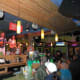 A bar known for boozy Hand Grenade cocktails plus live music, bar bites & balcony views