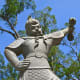 A Buddhist guardian watching over visitors making their way to Po Lin Monastery and Tian Tan Big Buddha.