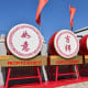 Good luck drums greeting visitors at the entrance to Ngong Ping Village.