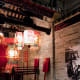 The interior of a traditional Hong Kong home. Displayed on the table is poon-choi, a popular dish traditionally eaten during Chinese New Year.