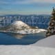 Wizard Island covered in snow.