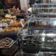 Remember to stuff yourself with fresh seafood here in the small eatery right in front of Dinh Cau Pagoda!
