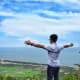 Me standing with my arms stretched out.