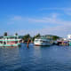 Passenger boats anchor for some rest.