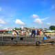 This boat is not only a small shop, but also the house of a small family.