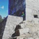 Sitting on the stone walls of an ancient Irish castle.