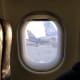 Each seat has it's own porthole style window with a sliding window cover.