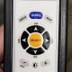A very basic remote was integrated into the armrest of each seat to control the screen in front of each passenger.
