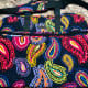 The Vera Bradley Grand Traveler Bag holds a ton and folds flat for easy storage in your cabin.
