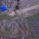 Base jumpers flying over the Snake River after jumping off of the Perrine Bridge in Twin Falls, Idaho.