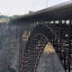 Base Jumper getting ready to jump from Perrine Bridge in Twin Falls, Idaho.