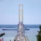 Freighter passing under the Mackinac Bridge as viewed from St. Ignace, Michigan.