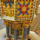 A close up of the decorated christening font