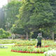 A gardener at work in one of the immaculate Abbey Gardens flowerbeds