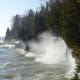 Waves crashing against the shore at Cave Point County Park in Door County, Wisconsin