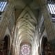 The high vaulted ceiling and rose window over the main entrance.