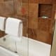 The shower had beautiful tile on the walls, but the tub and shower head could definitely use some updating. It was still very clean though!