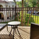 The back porch area with a great view of the well manicured grounds.