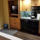 The kitchenette in the room had a dish washer, large sink, two stove tops, microwave, refrigerator (and freezer), coffee maker, blender, and much more!