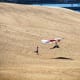 Hang Glider taking off at Jockey's Ridge State Park on the Outer Banks of North Carolina